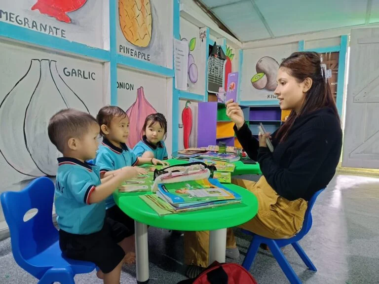 Teacher with student at BrainBunny Juniors