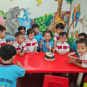 Group photo of children during birthday celebration at preschool