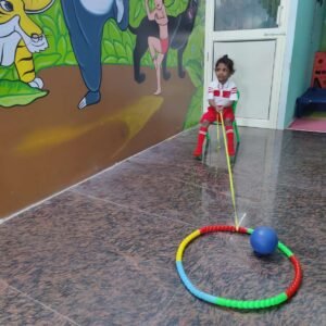 Child developing motor skills through play activity