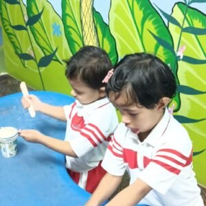 Child experiencing play-based learning in preschool