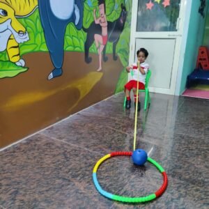 Preschooler playing with indoor educational toys