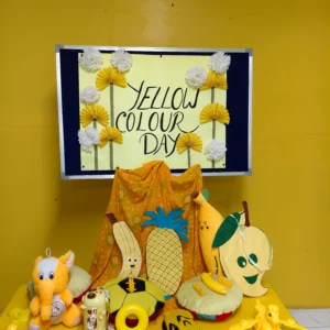 Teachers and toddlers enjoying Yellow Day theme celebration in Gurugram preschool