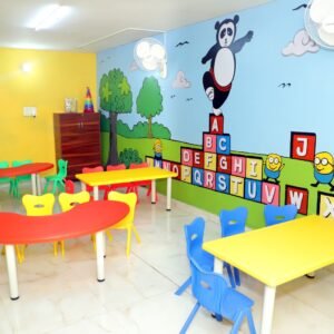 Young children practicing handwriting and fine motor skills.